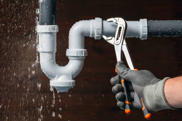 Professional Emergency Plumber technician working in Breezewood, PA